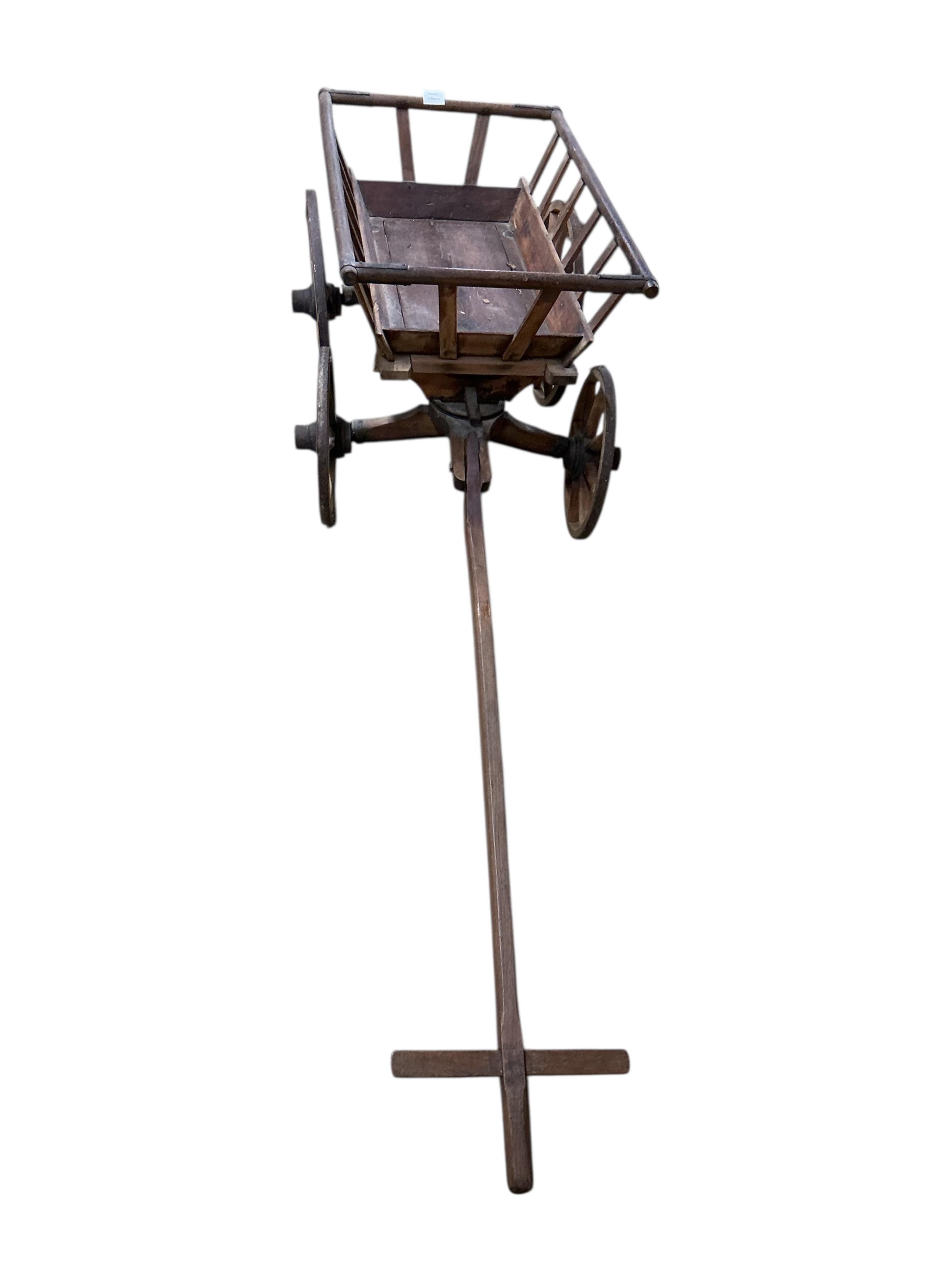 A Victorian iron bound dog cart, length 75cm, width 47cm